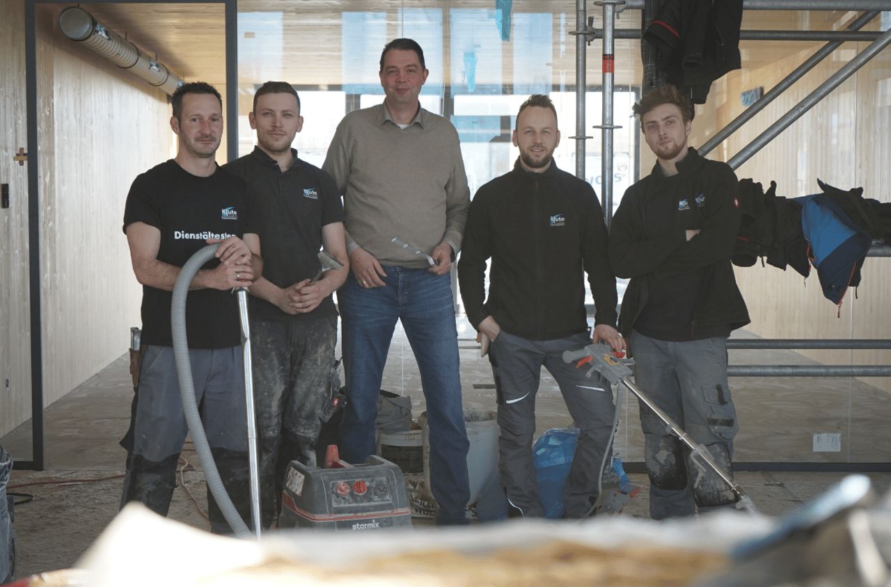 Eingespieltes Team eines Handwerksbetriebs